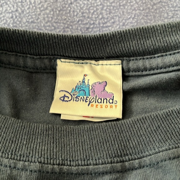 Disney 2X Men’s Disney Tee.  Never worn.   Jean blue color.  Great graphics. - Picture 4 of 5